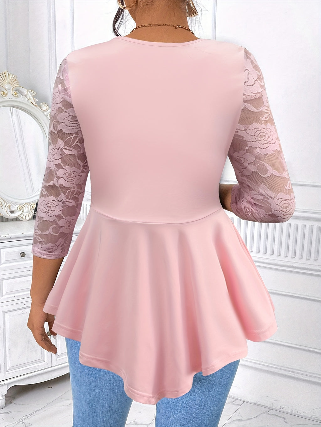 Women'S Irregular Long-Sleeve Top with Floral Lace And a Round Neckline.