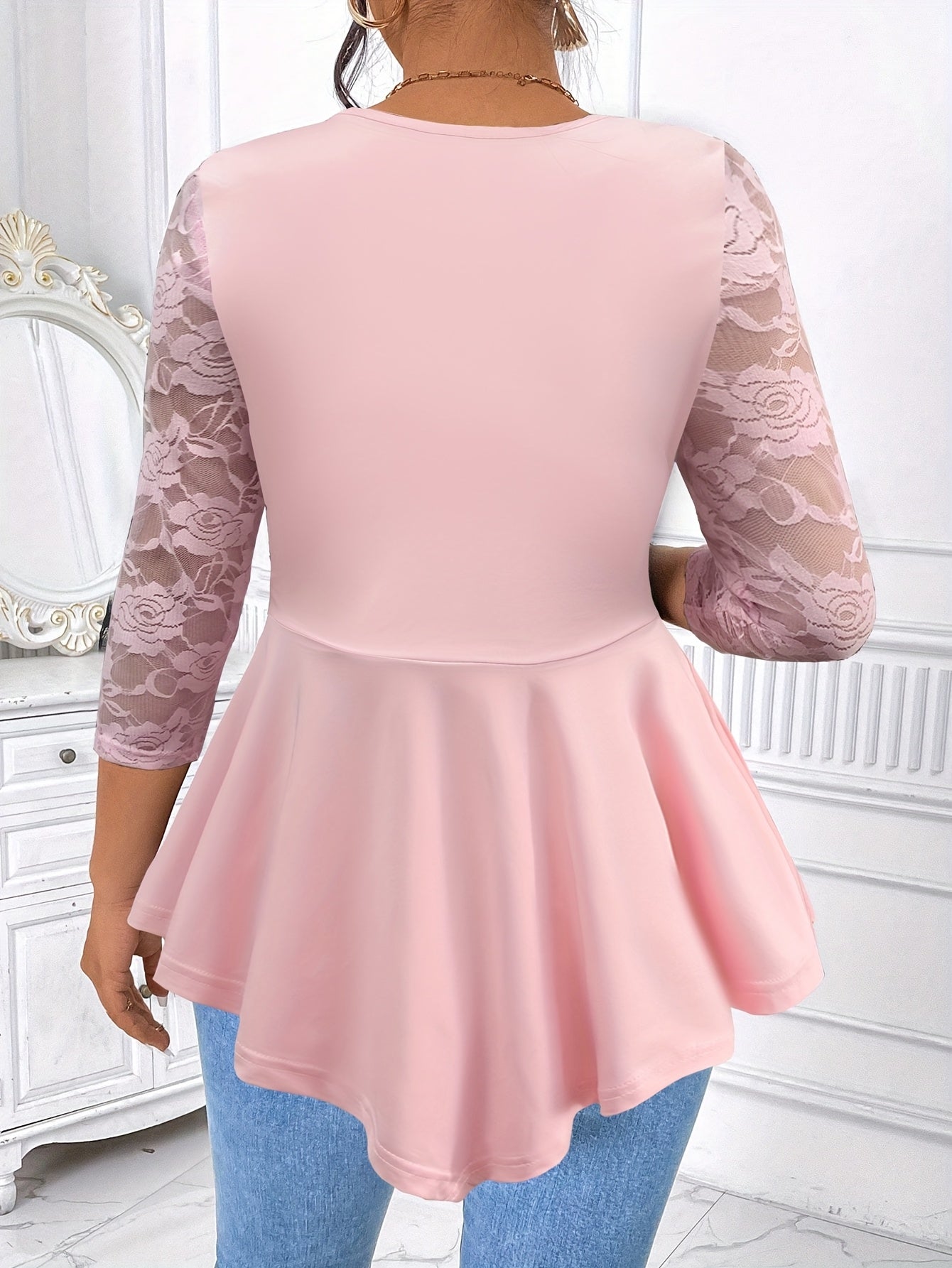 Women'S Irregular Long-Sleeve Top with Floral Lace And a Round Neckline.